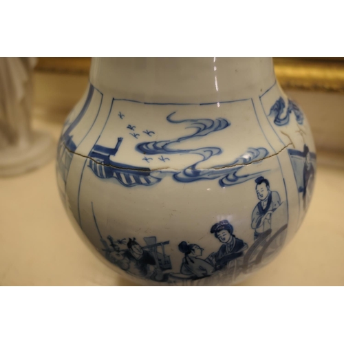 55 - Chinese blue and white bottle vase, Kangxi (1662-1722), decorated at the neck with travellers beneat... 