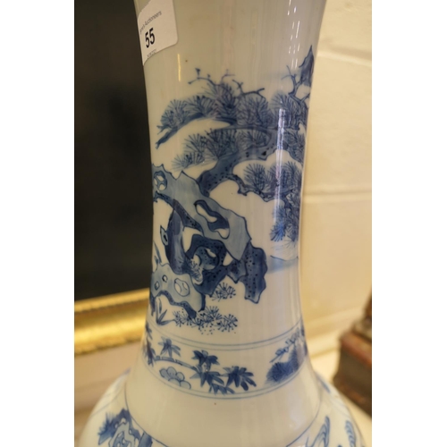 55 - Chinese blue and white bottle vase, Kangxi (1662-1722), decorated at the neck with travellers beneat... 