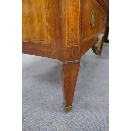 712 - French walnut and satinwood commode, 19th Century, the crossbanded satinwood top 
over three long dr... 