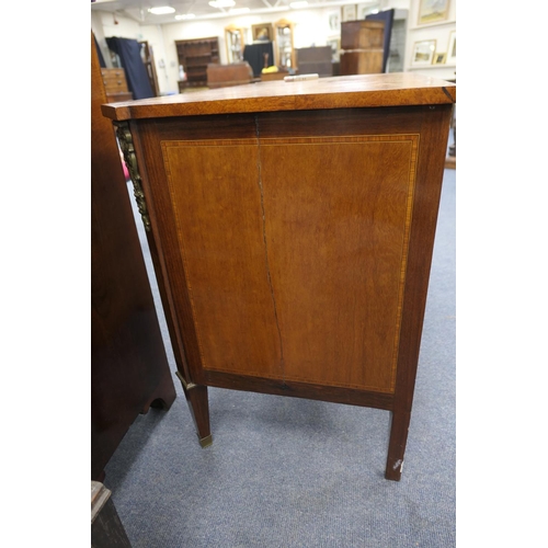 712 - French walnut and satinwood commode, 19th Century, the crossbanded satinwood top 
over three long dr... 