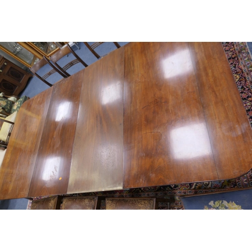 773 - George IV mahogany extending dining table, circa 1825, the top with D-shaped ends, with a reeded edg... 