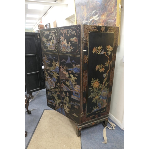 791 - Chinese painted and black lacquered cabinet, early 20th Century, having two bifold doors decorated t... 