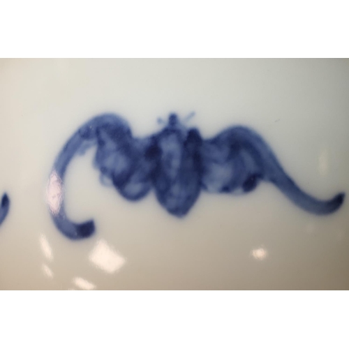 87 - Chinese porcelain tea bowl, decorated with flying bats in underglaze blue, painted Kangxi marks, 8cm... 