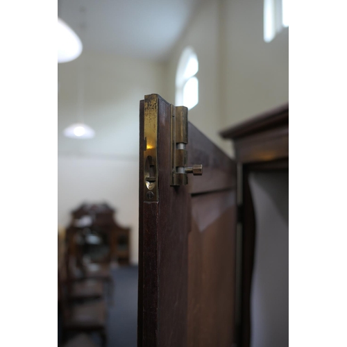 695 - Late George III mahogany press wardrobe, circa 1800-20, moulded cornice over two double recessed pan... 