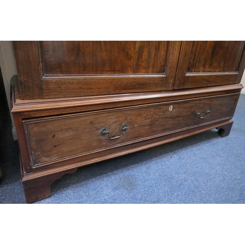 695 - Late George III mahogany press wardrobe, circa 1800-20, moulded cornice over two double recessed pan... 