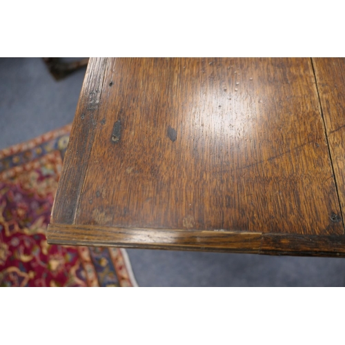 702 - Provincial oak side table, probably North Wales, circa 1810-30, two plank top over an unusual config... 