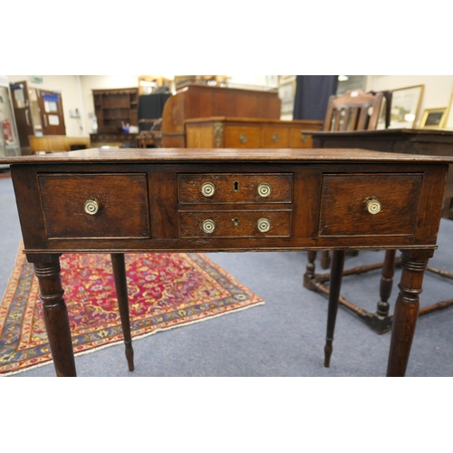 702 - Provincial oak side table, probably North Wales, circa 1810-30, two plank top over an unusual config... 