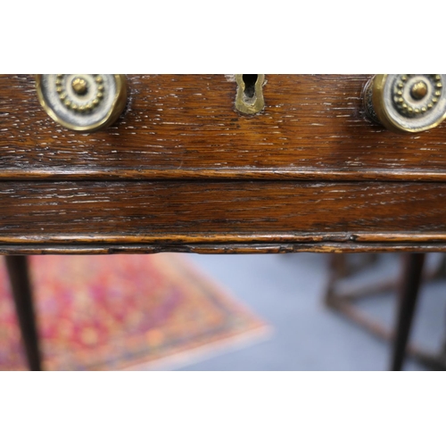 702 - Provincial oak side table, probably North Wales, circa 1810-30, two plank top over an unusual config... 