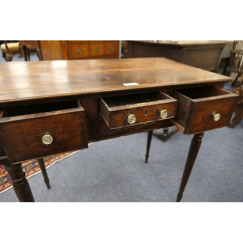 702 - Provincial oak side table, probably North Wales, circa 1810-30, two plank top over an unusual config... 