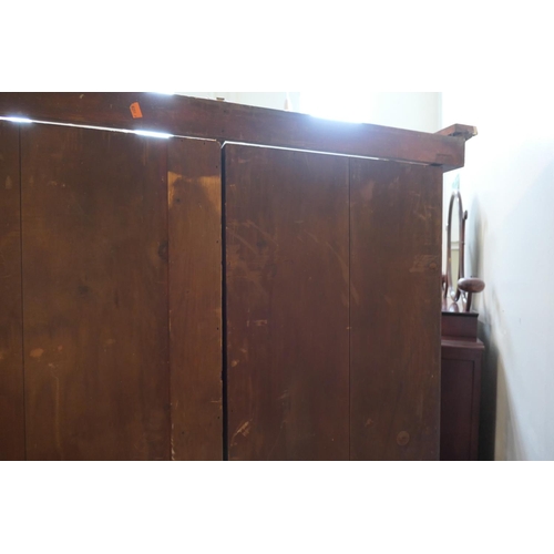 744 - William IV mahogany breakfront press cupboard, circa 1835, centred with two flame mahogany panel doo... 