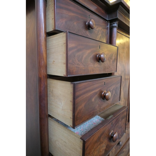 744 - William IV mahogany breakfront press cupboard, circa 1835, centred with two flame mahogany panel doo... 