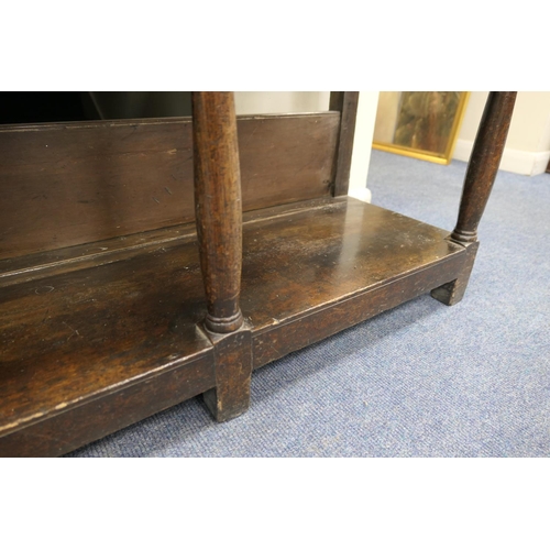 747 - Late George III oak dresser and plate rack, circa 1800, the boarded rack with three shelves and thre... 