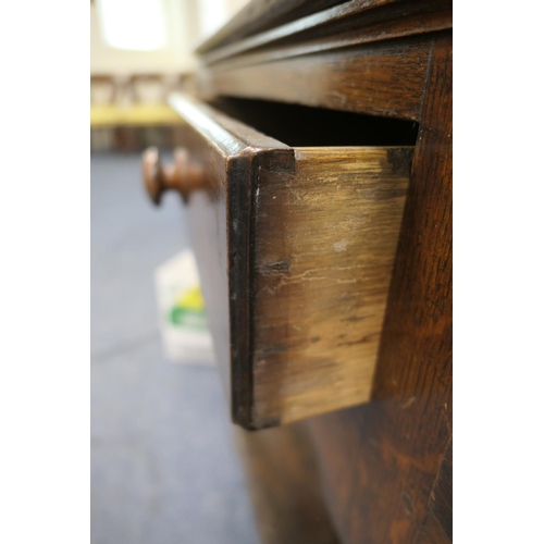 747 - Late George III oak dresser and plate rack, circa 1800, the boarded rack with three shelves and thre... 