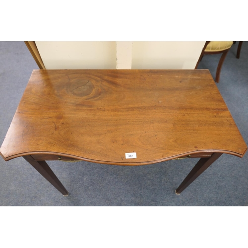 687 - Mahogany serpentine side table, 19th Century, the top with a moulded edge over a long frieze drawer ... 