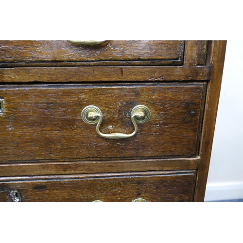 697 - Small oak bureau, 19th Century conversion, having a slope front opening to an interior with cupboard... 