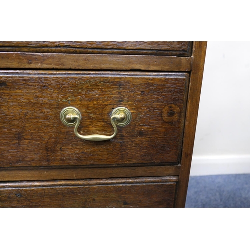 697 - Small oak bureau, 19th Century conversion, having a slope front opening to an interior with cupboard... 