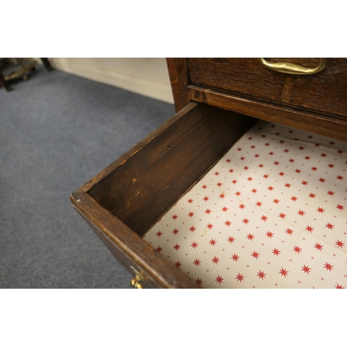 697 - Small oak bureau, 19th Century conversion, having a slope front opening to an interior with cupboard... 