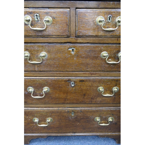 697 - Small oak bureau, 19th Century conversion, having a slope front opening to an interior with cupboard... 