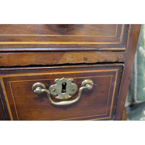 745 - George III mahogany and inlaid kneehole desk, circa 1800 and later, the top with satinwood and harew... 