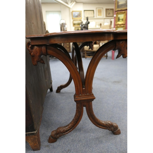 769 - Unusual Continental walnut centre table, circa 1900, the shaped rectangular top raised on curved sup... 