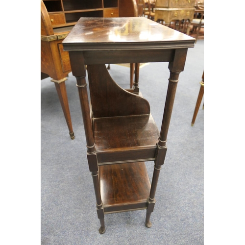 779 - Mahogany bookstand, 19th Century, in Georgian style having a bi-sectional mid shelf supported on sle... 