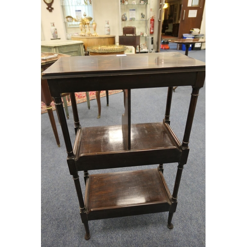 779 - Mahogany bookstand, 19th Century, in Georgian style having a bi-sectional mid shelf supported on sle... 