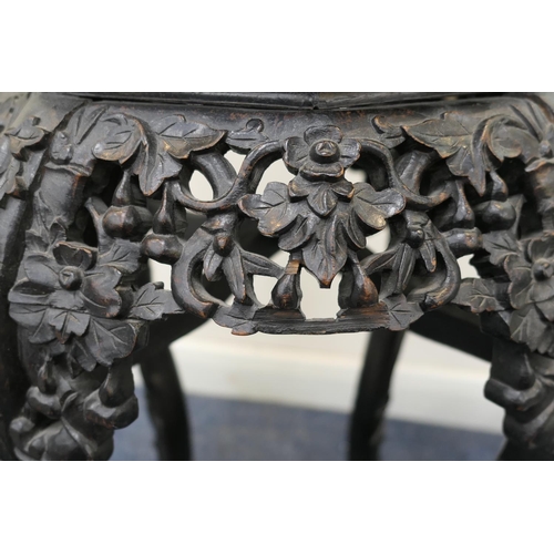 796 - Chinese carved hardwood jardiniere stand, late 19th Century, the octagonal top with beaded edge and ... 