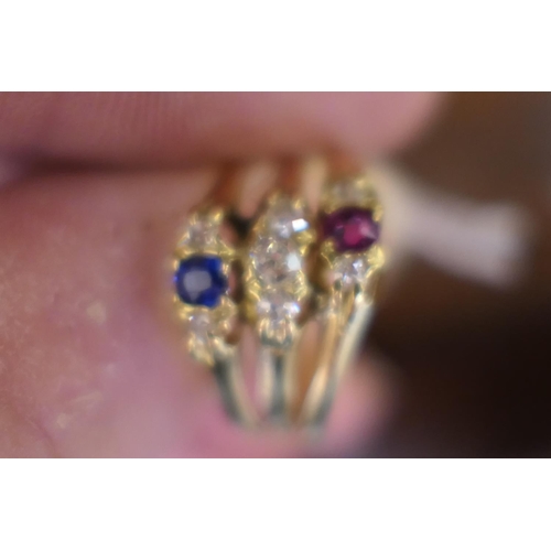 392 - Victorian gem set trinity ring, hallmarked Birmingham 1886, having three conjoined rings set with di... 