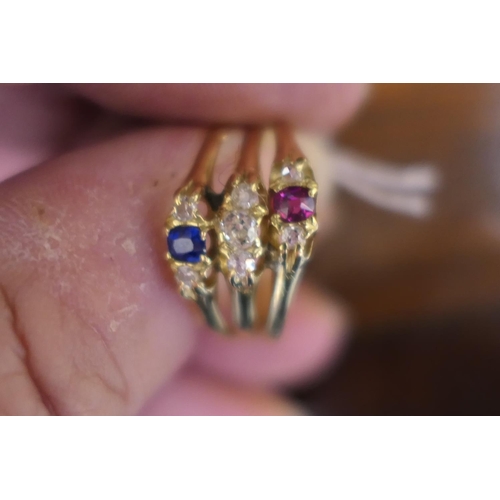 392 - Victorian gem set trinity ring, hallmarked Birmingham 1886, having three conjoined rings set with di... 