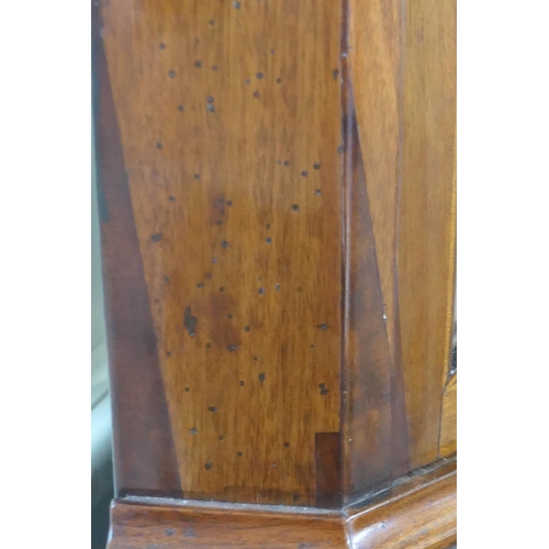 705 - Mahogany glazed freestanding corner cabinet, 19th Century, having a swan neck pediment centred with ... 