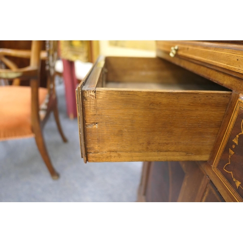 706 - Late George III mahogany and inlaid bookcase cabinet, circa 1790-1810, of small proportions, surmoun... 