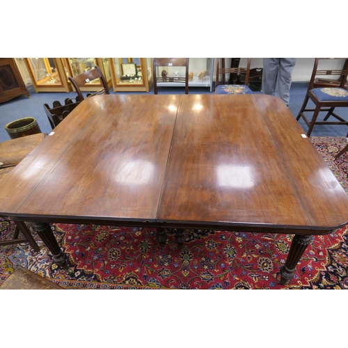 773 - George IV mahogany extending dining table, circa 1825, the top with D-shaped ends, with a reeded edg... 