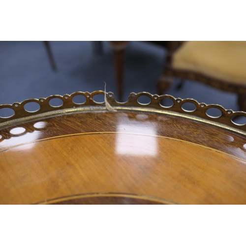 776 - Pair of Italian mahogany and inlaid two tier tables, each with a brass galleried circular top centre... 