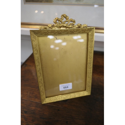 664 - French gilt ormolu photograph frame, circa 1900, rectangular form with ribbon surmount, interior siz... 