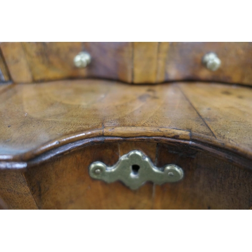 688 - Walnut dressing mirror, early 18th Century, having a shaped bevelled glass plate within a cushion mo... 