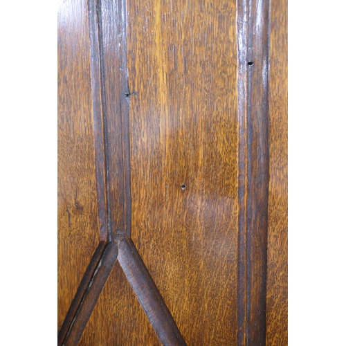 696 - Victorian Flemish carved oak cabinet, the upper part with two cupboard doors, each with carved doubl... 