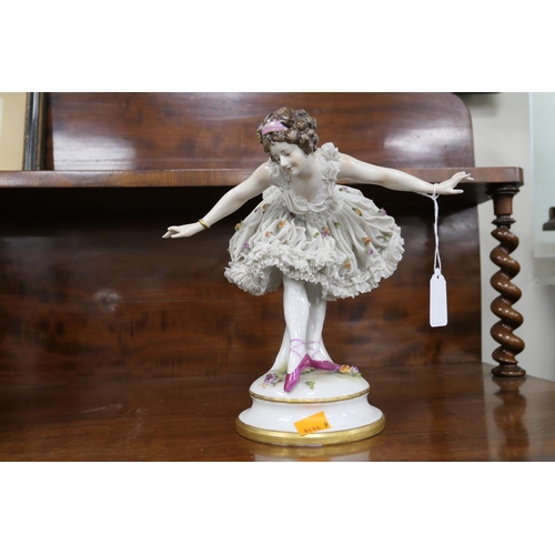62 - Dresden porcelain figurine of a ballerina, height 26cm
