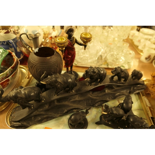 137 - Carved ebony elephant ornament, a Blackamoor style figural candelabrum etc.