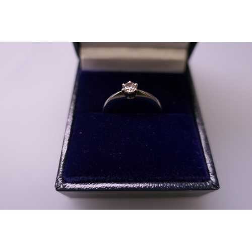 345 - Diamond solitaire ring with round brilliant cut stone of approx. 0.2ct set in platinum, ring size K,... 