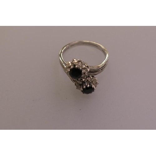 359 - Sapphire and diamond double cluster crossover ring in 18ct white gold, ring size M/N, gross weight 4... 