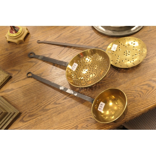 537 - Two brass skimmers and a copper ladle