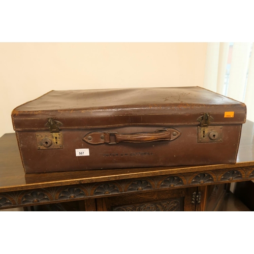 567 - Vintage leather suitcase inscribed 'Peter Cotterill'