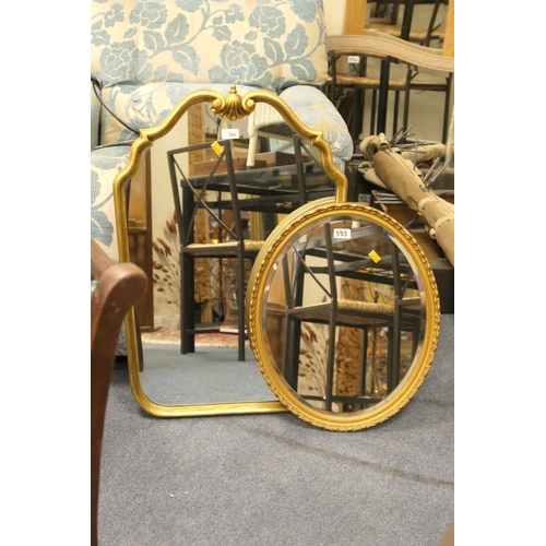 595 - Decorative gilt framed wall mirror and an oval wall mirror (2)