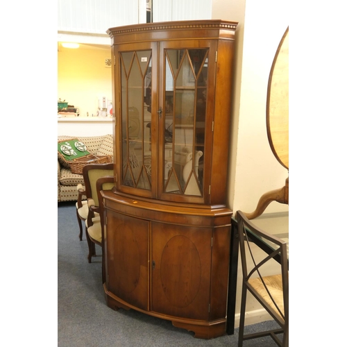 596 - Yew wood bow front freestanding corner display cabinet