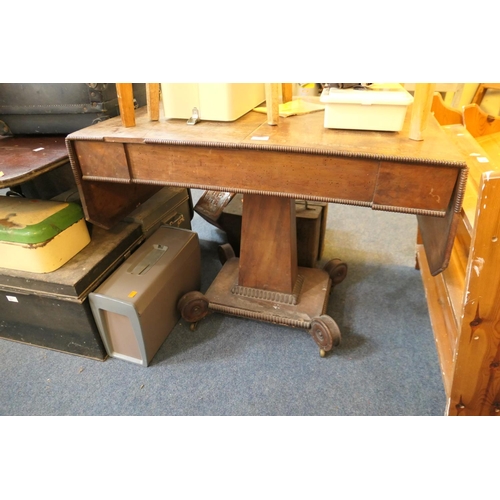 609 - Late Regency mahogany and rosewood banded pedestal sofa table