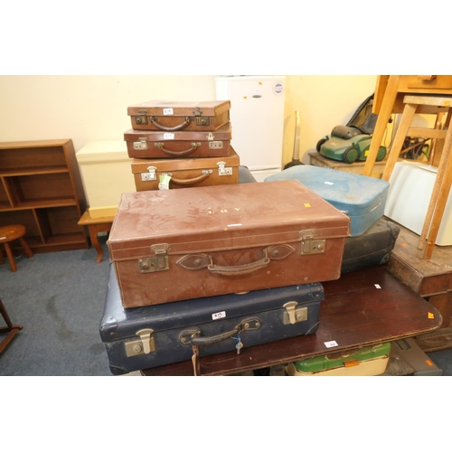 619 - Various vintage suitcases