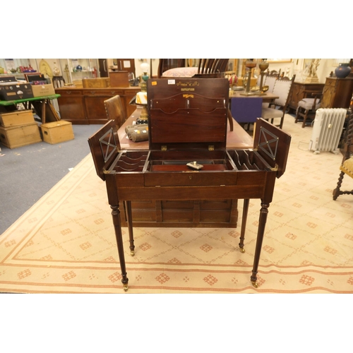 671 - The Britisher patent folding mahogany desk