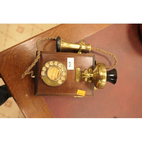 674 - Vintage style mahogany cased brass wall mounted dial telephone