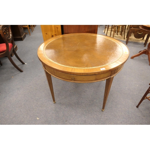 683 - Mahogany leather topped drum table in the Georgian style fitted with two drawers and two slides on t... 