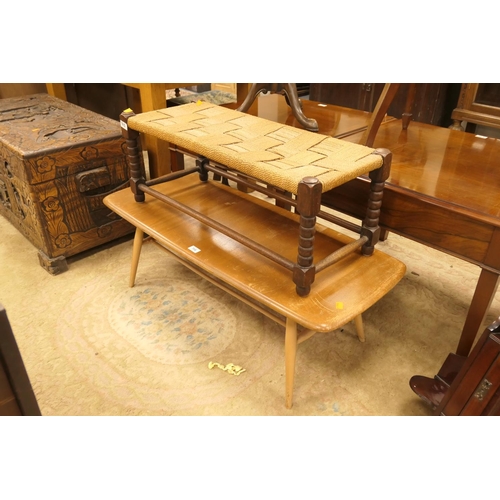 713 - Ercol blond elm coffee table; also a string topped companion stool (2)